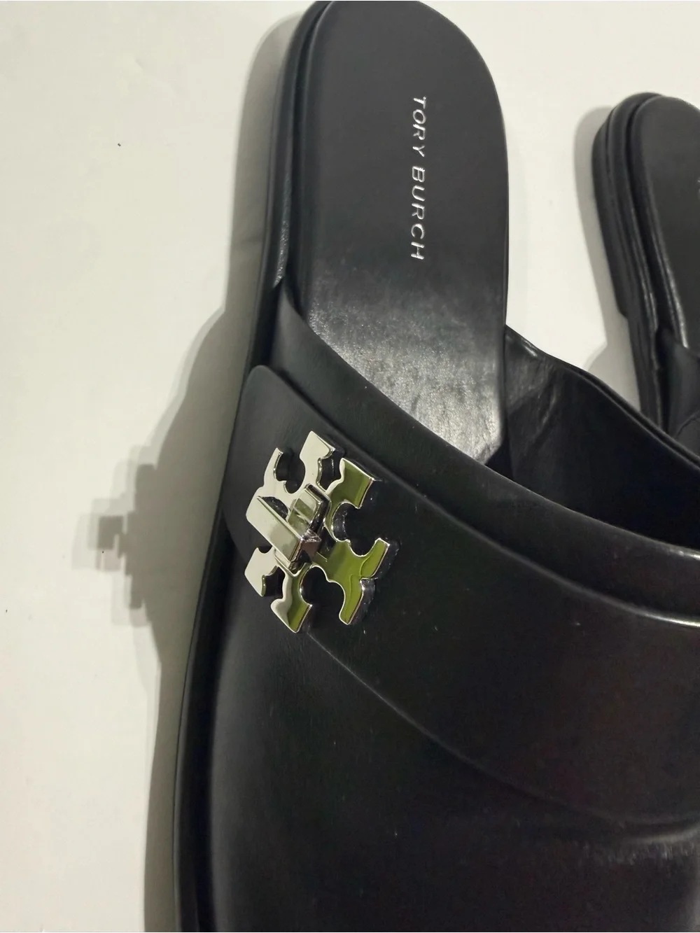 Tory Burch Black Leather Slide Mules with Silver Logo Accent
